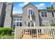 A detailed view from outside of the deck and home, exhibiting its design and inviting space at 6505 Miramar Ct, Indianapolis, IN 46250