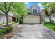 Charming two-story home featuring a two-car garage and well-maintained landscaping at 6505 Miramar Ct, Indianapolis, IN 46250