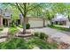 Charming two-story home featuring a two-car garage and beautifully landscaped front yard at 6505 Miramar Ct, Indianapolis, IN 46250