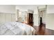 Spacious main bedroom with hardwood floors, walk-in closet and en-suite bathroom at 6505 Miramar Ct, Indianapolis, IN 46250