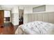 Main bedroom with hardwood floors, built-in cabinets, and a walk-in closet at 6505 Miramar Ct, Indianapolis, IN 46250