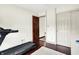 Bright room features a treadmill and doorway at 6505 Miramar Ct, Indianapolis, IN 46250
