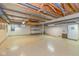 Spacious unfinished basement with open ceiling and concrete block walls at 6530 Kingswood Dr, Indianapolis, IN 46256