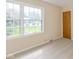 Bright bedroom featuring carpet and natural light from the windows at 6530 Kingswood Dr, Indianapolis, IN 46256