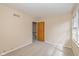 Cozy bedroom with closet and natural light from the window at 6530 Kingswood Dr, Indianapolis, IN 46256