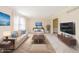 Staged living room featuring modern furnishings and decor creating a cozy ambiance at 6530 Kingswood Dr, Indianapolis, IN 46256
