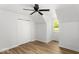 Bright bedroom with a large closet, wood floors, and a view of the outdoors at 6682 English Dr, Avon, IN 46123
