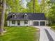 Charming two-story home with a well-maintained lawn and a two-car garage at 6682 English Dr, Avon, IN 46123