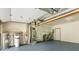 Organized garage space featuring utilities, storage shelves, and laundry appliances at 6682 English Dr, Avon, IN 46123