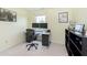 Bright bedroom featuring a modern desk setup and neutral decor for a comfortable workspace at 6839 Powder Dr, Indianapolis, IN 46259