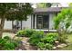 Charming backyard featuring a garden and porch with swing, perfect for relaxing and enjoying nature at 7228 Kimberly Ln, Plainfield, IN 46168