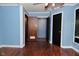 Spacious bedroom with hardwood floors and two closets, perfect for storage at 7228 Kimberly Ln, Plainfield, IN 46168
