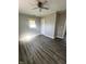 Comfortable bedroom featuring modern vinyl floors and ample closet space with natural light at 728 Lonsvale Dr, Anderson, IN 46013