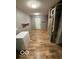 Basement area with painted walls and wood flooring at 7835 Caswell St, Indianapolis, IN 46259