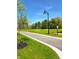 Enjoy outdoor living along a green paved walking path at 811 J Mccool Way, Greenwood, IN 46142