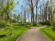 Discover a winding paved walking path offering outdoor activities at 811 J Mccool Way, Greenwood, IN 46142