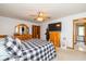 Relaxing bedroom with a patterned bedspread and plenty of dresser storage at 8111 Timberwood Dr, Plainfield, IN 46168