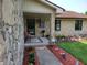 Welcoming front porch with decorative gnomes and colorful welcome mat at 8111 Timberwood Dr, Plainfield, IN 46168