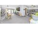 Spacious carpeted living room with a large window providing ample natural light at 8111 Timberwood Dr, Plainfield, IN 46168