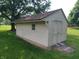 Exterior view of storage shed with double doors and classic design at 8111 Timberwood Dr, Plainfield, IN 46168