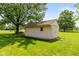 Exterior view of shed featuring traditional architecture, gable roof and lush surroundings at 8111 Timberwood Dr, Plainfield, IN 46168