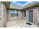 The exterior features a brick facade, windows, and a back entrance, offering privacy at 815 Stewart Rd, Anderson, IN 46012