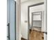 Bathroom featuring a walk-in closet, a blue glass shower, and gray trim at 815 Stewart Rd, Anderson, IN 46012