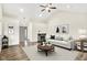 Bright living room features vaulted ceilings, fireplace, and modern decor at 815 Stewart Rd, Anderson, IN 46012