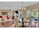 Inviting living and dining areas, featuring hardwood floors and cozy furnishings at 8704 New Heritage Dr, Indianapolis, IN 46239