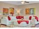 Comfortable living room with stylish decor, a large sofa, and hardwood floors at 8704 New Heritage Dr, Indianapolis, IN 46239