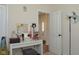Bright bedroom featuring a makeup vanity, stylish decor, and a light neutral color scheme at 8732 Wicklow Way, Brownsburg, IN 46112