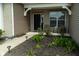 Charming covered front porch with nice landscaping, a brick facade, and outdoor seating at 8732 Wicklow Way, Brownsburg, IN 46112