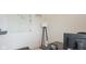 Home office with sleek desk, white board, and modern floor lamp at 8732 Wicklow Way, Brownsburg, IN 46112