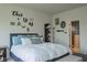This main bedroom features a queen-size bed with access to an ensuite bathroom at 8732 Wicklow Way, Brownsburg, IN 46112