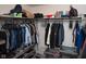 Organized walk-in closet featuring ample shelving, hanging racks, and storage solutions at 8732 Wicklow Way, Brownsburg, IN 46112