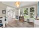 This playroom features hardwood floors and several windows that let in a lot of natural light at 9179 Brookstone Pl, Zionsville, IN 46077