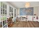 Bright playroom features a map of the world, several windows, and hardwood floors at 9179 Brookstone Pl, Zionsville, IN 46077