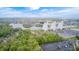 Sprawling view of cityscape featuring a beautiful lake, building and lush trees at 9324 W Point Pl, Indianapolis, IN 46268