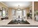 Modern kitchen with granite counters, cooktop, and bright bay window nook dining area at 9324 W Point Pl, Indianapolis, IN 46268