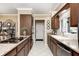 Traditional kitchen features granite countertops, stainless steel appliances, and white tile flooring at 9324 W Point Pl, Indianapolis, IN 46268