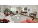 Bright living room featuring a comfortable sofa, stylish seating, and elegant furnishings at 9324 W Point Pl, Indianapolis, IN 46268