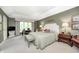 Spacious bedroom featuring large window, carpet, accent lighting and multiple seating options at 9324 W Point Pl, Indianapolis, IN 46268