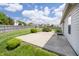 Spacious backyard featuring a well-maintained lawn, wooden fence, and a concrete patio, perfect for outdoor enjoyment at 1008 Canary Creek Ct, Franklin, IN 46131