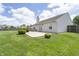 Wide open backyard featuring a well-maintained lawn and patio, perfect for outdoor activities and entertainment at 1008 Canary Creek Ct, Franklin, IN 46131