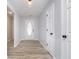 Bright entryway with light wood floors and white trim, leading into the main living areas at 1008 Canary Creek Ct, Franklin, IN 46131