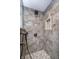 Modern tile shower featuring a rainfall shower head and built-in niche at 1008 Canary Creek Ct, Franklin, IN 46131