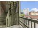 Exterior balcony with stair access and city views at 108 E Saint Clair St # E, Indianapolis, IN 46204
