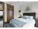 Inviting bedroom with a large bed, bedside table, and a cozy ambiance at 108 E Saint Clair St # E, Indianapolis, IN 46204