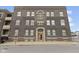 Elegant exterior of a brick building with symmetrical windows and a classic entrance at 108 E Saint Clair St # E, Indianapolis, IN 46204