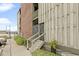 Apartment exterior with secure access and manicured landscaping at 108 E Saint Clair St # E, Indianapolis, IN 46204